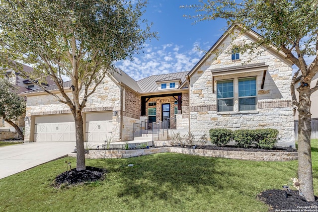 view of front of property with a garage, stone siding, metal roof, a standing seam roof, and a front lawn