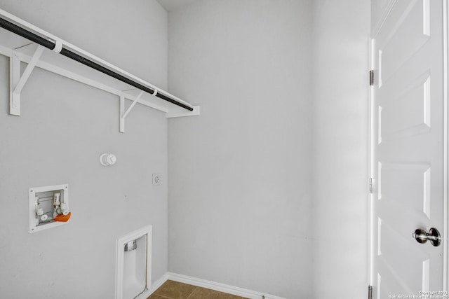 clothes washing area featuring laundry area, hookup for a washing machine, baseboards, and hookup for an electric dryer