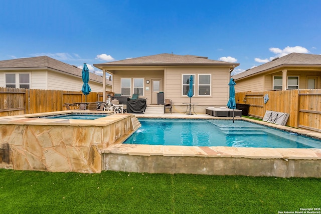 back of property with a patio area, a fenced backyard, a fenced in pool, and an in ground hot tub