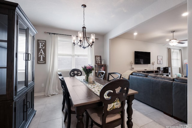 dining room featuring light tile patterned floors, recessed lighting, baseboards, and ceiling fan with notable chandelier