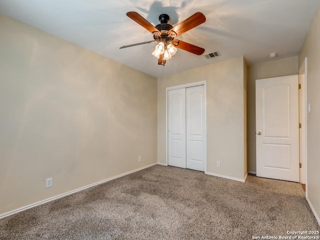 10327 Cougar Gap, San Antonio, TX 78251 - unfurnished bedroom featuring a closet, carpet flooring, visible vents, and baseboards