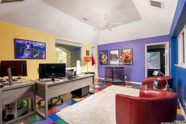 office with vaulted ceiling, ceiling fan, visible vents, and tile patterned floors