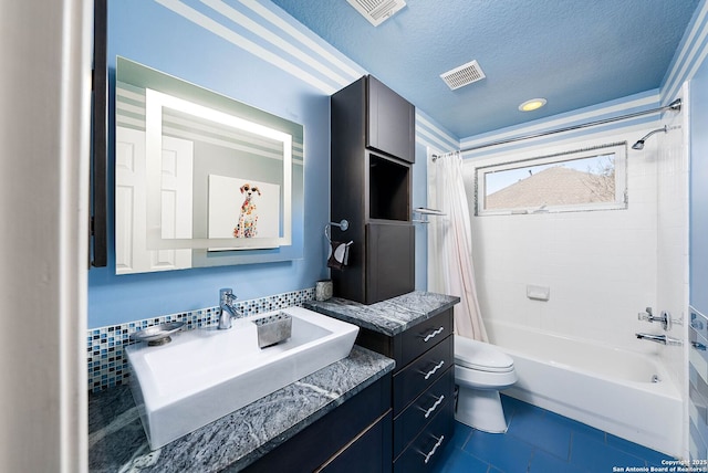 bathroom featuring a textured ceiling, toilet, vanity, tile patterned floors, and shower / bathtub combination with curtain