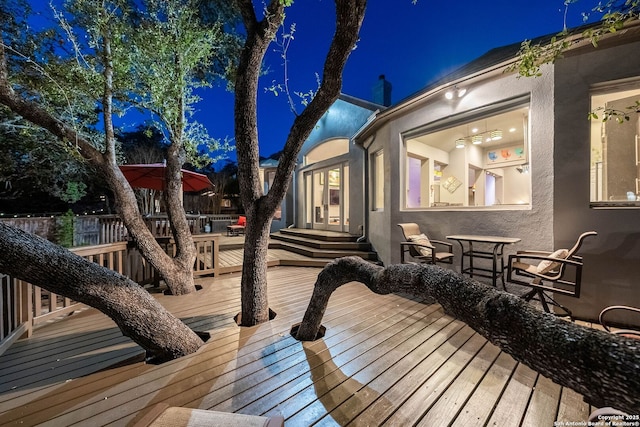 view of deck at night