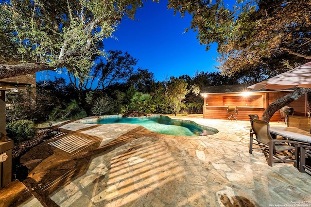 outdoor pool featuring a patio area