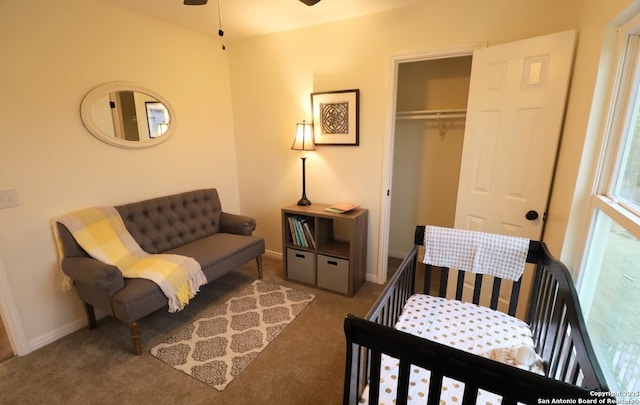 bedroom with carpet floors, a closet, and baseboards