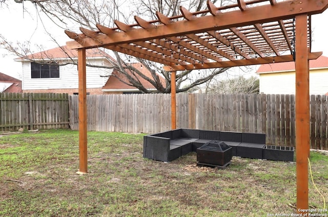 view of yard featuring an outdoor living space with a fire pit and a fenced backyard