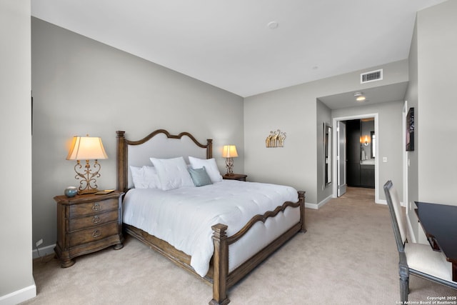 bedroom featuring light carpet, visible vents, and baseboards