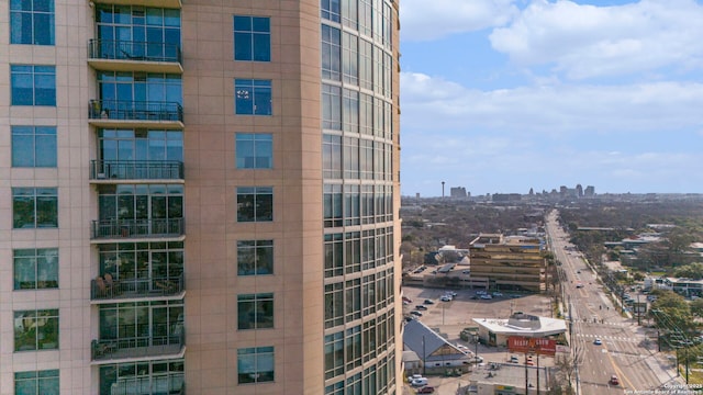 view of building exterior with a city view