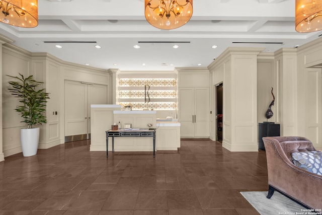 corridor featuring beamed ceiling, coffered ceiling, and a decorative wall