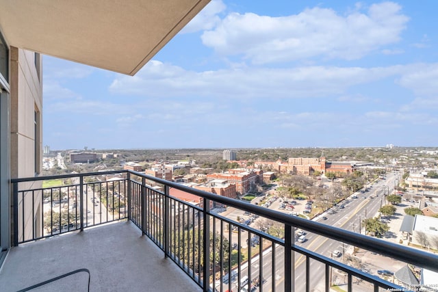 balcony featuring a city view