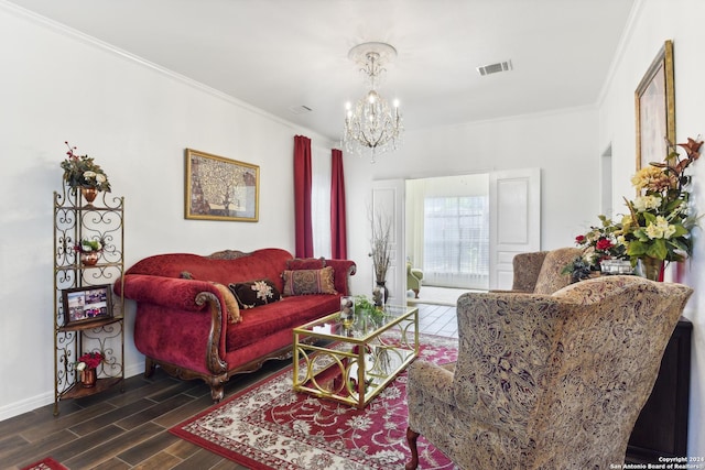 living area featuring a chandelier, wood finish floors, visible vents, baseboards, and crown molding