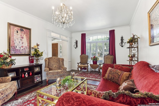 living area featuring a notable chandelier, baseboards, wood finished floors, and crown molding