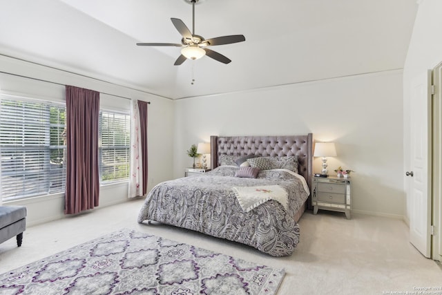 bedroom featuring lofted ceiling, carpet flooring, a ceiling fan, and baseboards