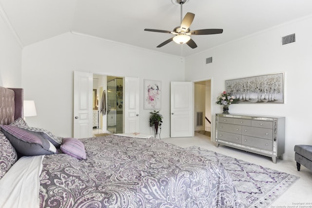 carpeted bedroom with lofted ceiling, visible vents, ornamental molding, and connected bathroom