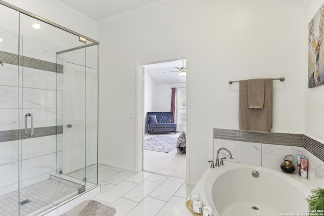 ensuite bathroom featuring a garden tub, a shower stall, crown molding, and ensuite bathroom