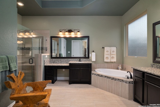 full bathroom featuring vanity, a shower stall, a bath, and tile patterned floors