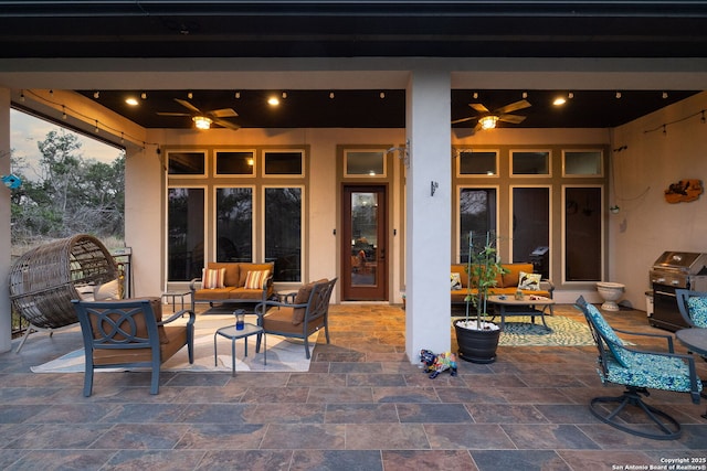 view of patio featuring an outdoor hangout area, grilling area, and a ceiling fan