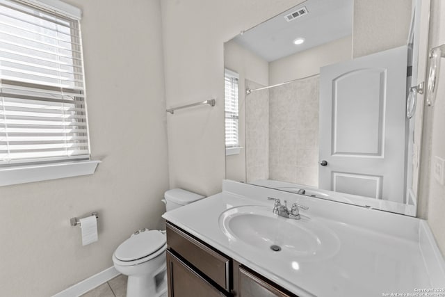 full bath with toilet, visible vents, a shower, and vanity