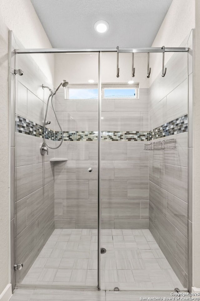 bathroom with a stall shower