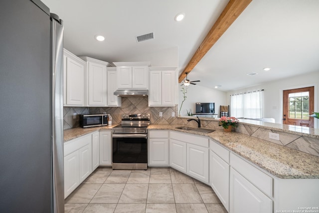 kitchen with stainless steel appliances, visible vents, backsplash, a sink, and under cabinet range hood