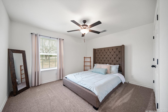 bedroom featuring a ceiling fan, carpet flooring, visible vents, and baseboards