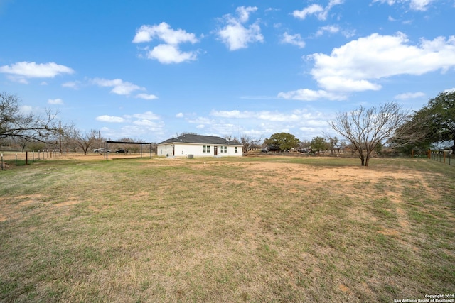 view of yard with a rural view