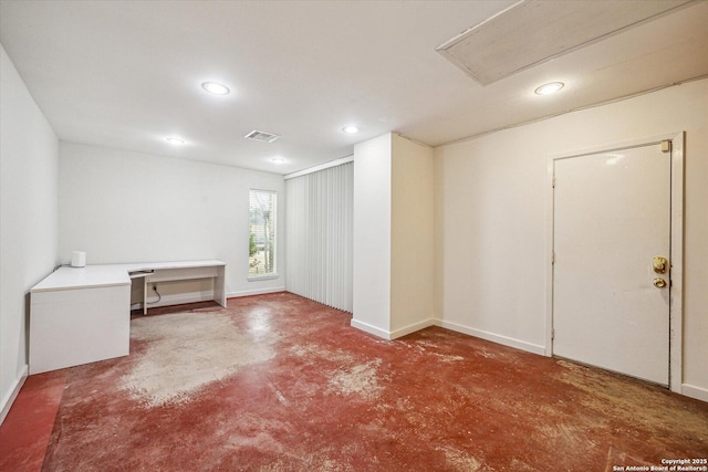 spare room featuring baseboards, visible vents, concrete flooring, and recessed lighting