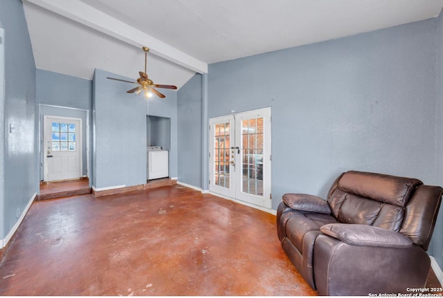 living room with baseboards, washer / clothes dryer, vaulted ceiling with beams, french doors, and concrete floors