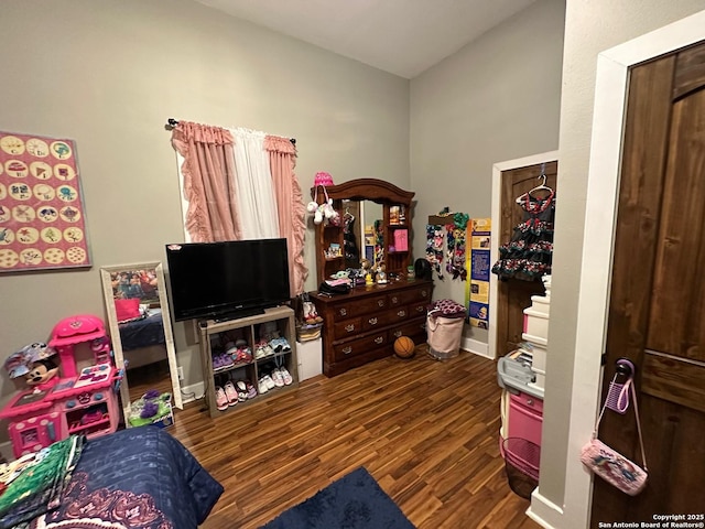 bedroom with wood finished floors