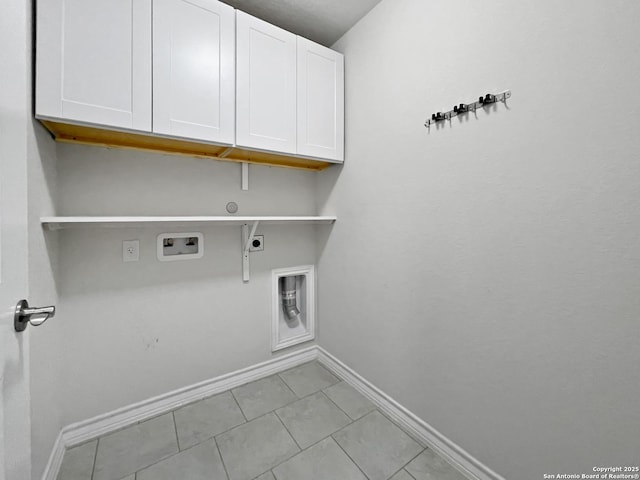 clothes washing area featuring cabinet space, light tile patterned floors, baseboards, hookup for a washing machine, and electric dryer hookup