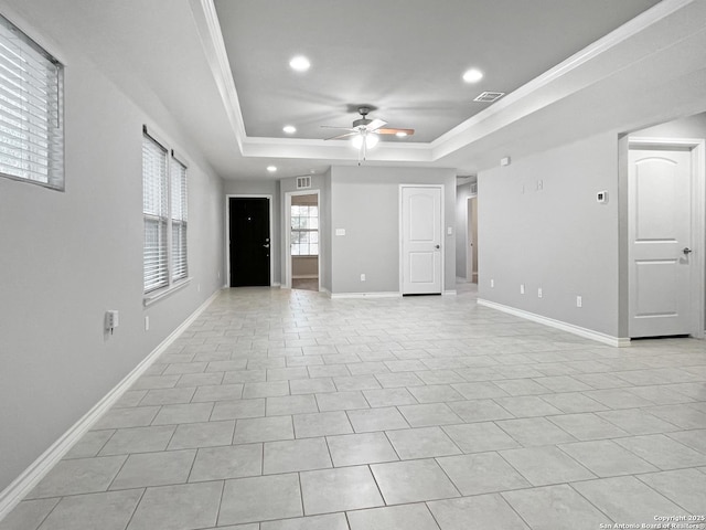 unfurnished living room featuring ceiling fan, recessed lighting, visible vents, baseboards, and a raised ceiling