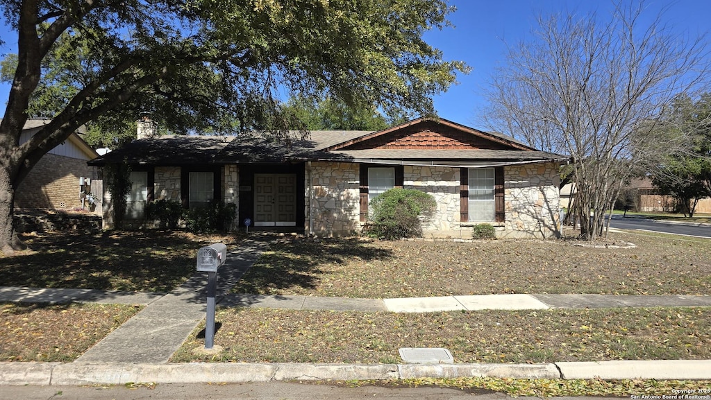 view of front of property featuring stone siding