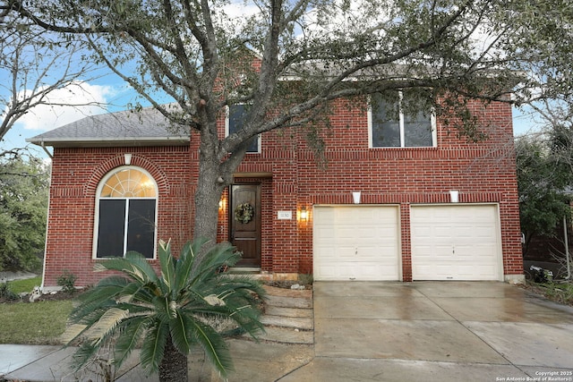 view of front facade featuring a garage, a shingled roof, concrete driveway, and brick siding