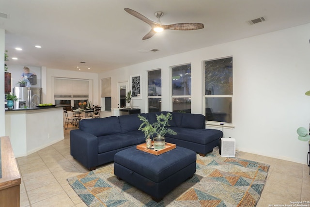 living area featuring recessed lighting, visible vents, ceiling fan, and light tile patterned floors