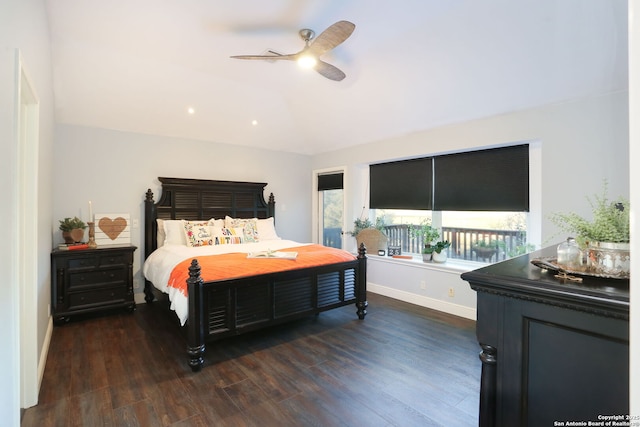 bedroom featuring ceiling fan, baseboards, and dark wood-type flooring