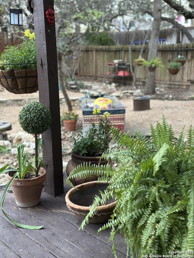 view of patio featuring fence