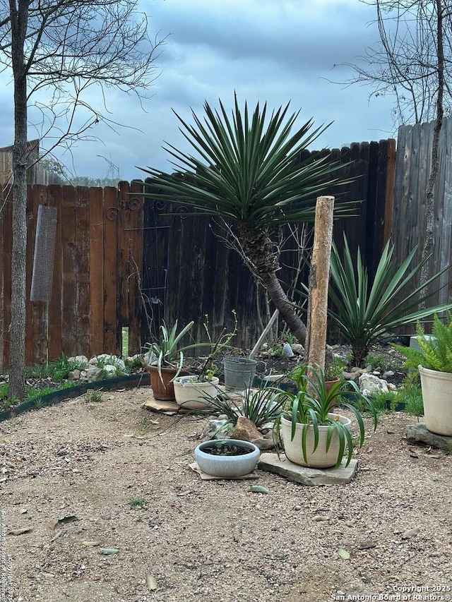 view of yard with fence