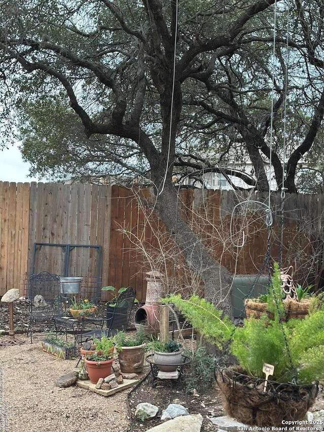 view of yard with fence