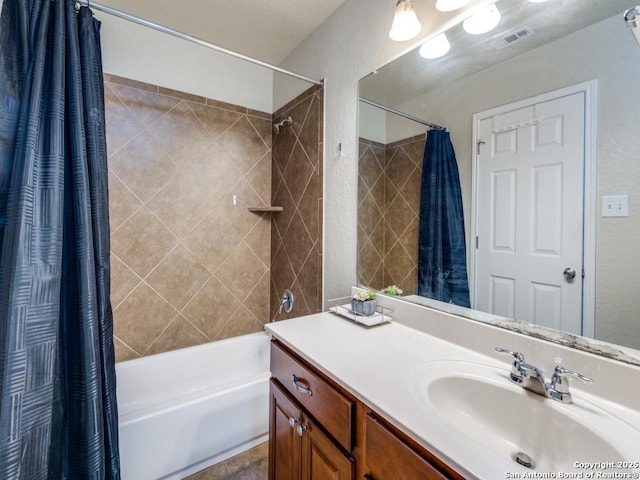 bathroom with vanity, shower / bath combination with curtain, and visible vents