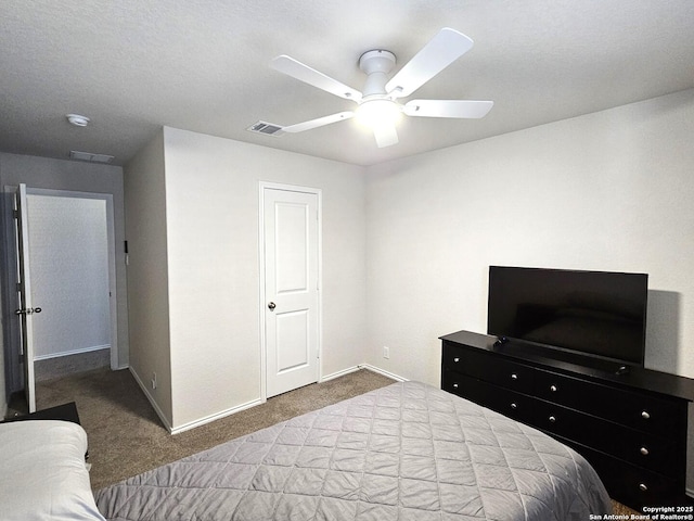 bedroom with carpet floors, visible vents, baseboards, and a ceiling fan