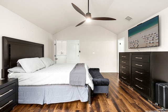 bedroom featuring a ceiling fan, visible vents, vaulted ceiling, and dark wood-type flooring