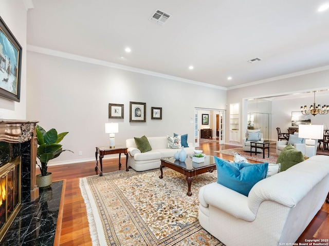 10 Parman Pl, San Antonio, TX 78230 - living room with a premium fireplace, ornamental molding, wood finished floors, recessed lighting, and baseboards