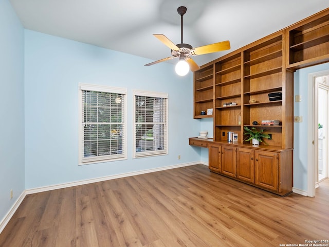 10 Parman Pl, San Antonio, TX 78230 - unfurnished office featuring light wood finished floors, baseboards, and ceiling fan
