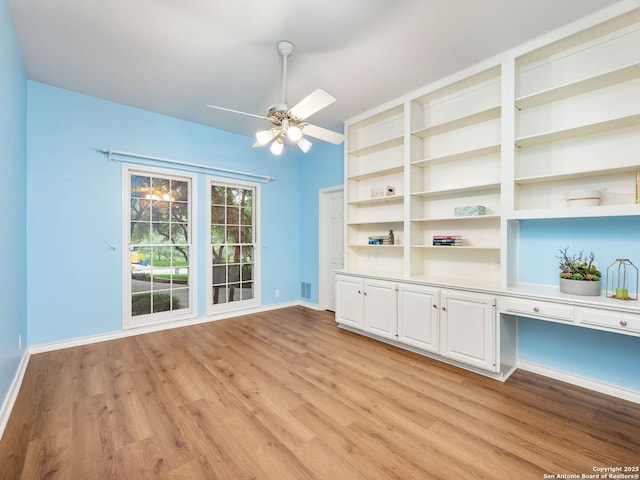 10 Parman Pl, San Antonio, TX 78230 - unfurnished room with light wood finished floors, baseboards, and ceiling fan