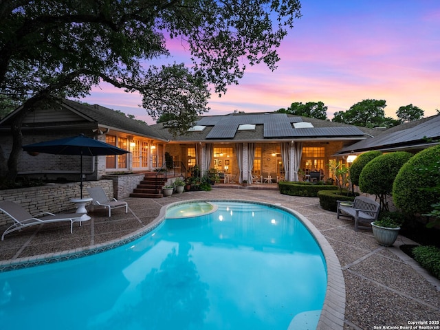 10 Parman Pl, San Antonio, TX 78230 - pool at dusk with a patio and an outdoor pool
