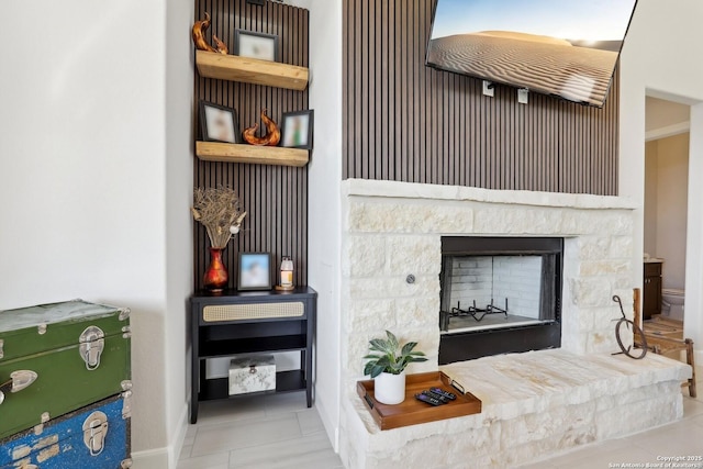 room details with a fireplace and baseboards