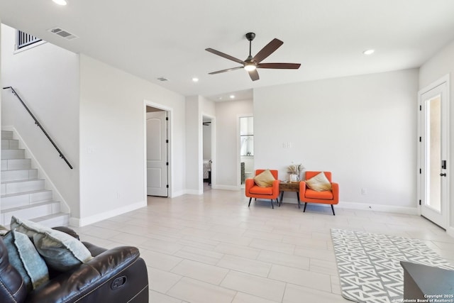 interior space featuring stairs, baseboards, visible vents, and recessed lighting