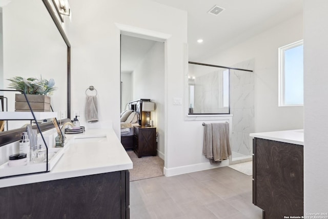 full bathroom with recessed lighting, visible vents, vanity, baseboards, and a marble finish shower