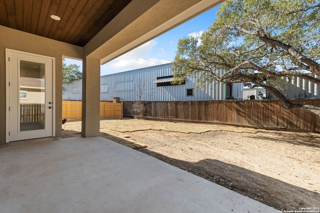 view of yard featuring a fenced backyard and a patio